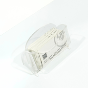 Plexiglass business card holder on white background – modern acrylic card display stand for retail counters and offices