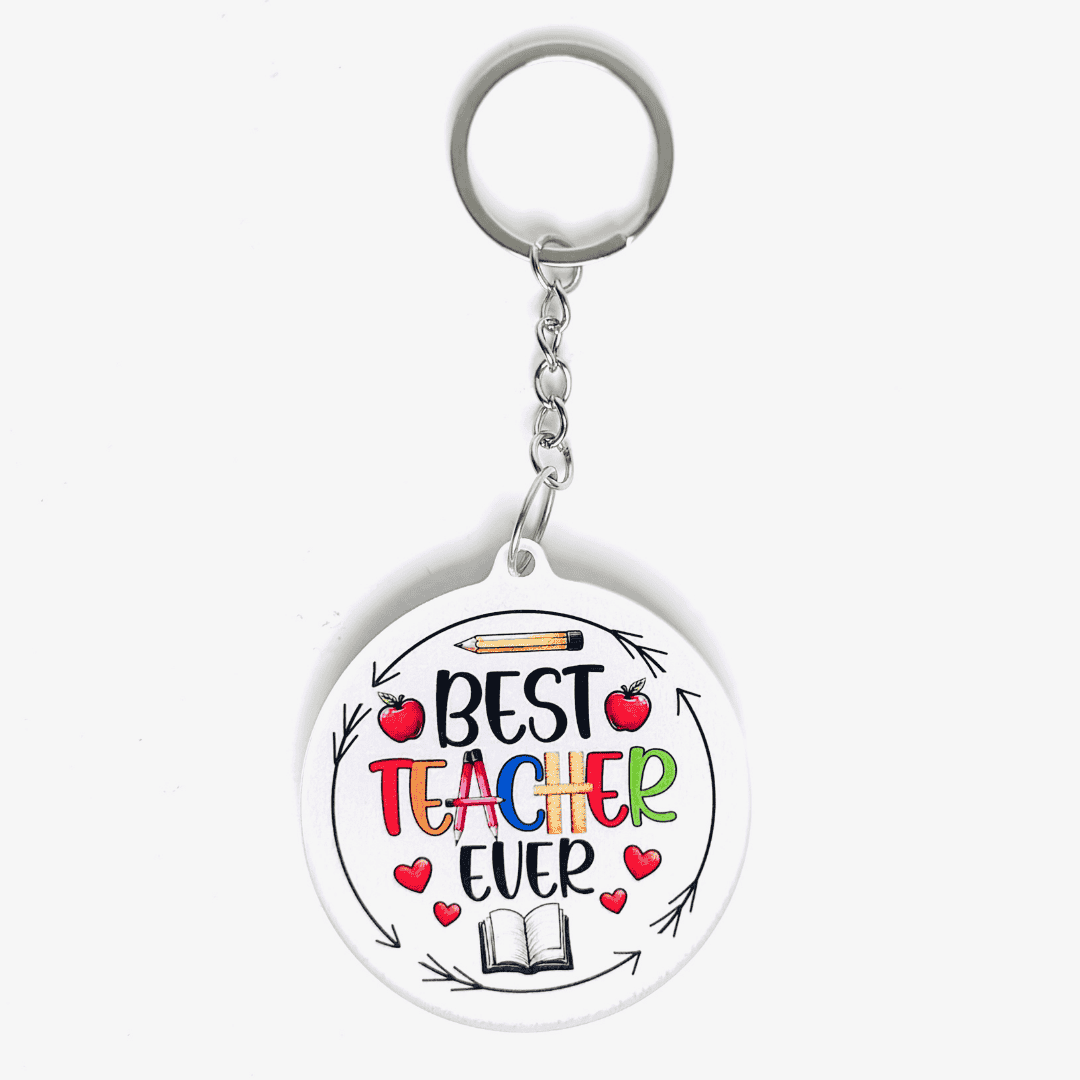 Best Teacher Ever acrylic keychain gift for teachers in Kuwait – white round design with colorful text, apples, hearts, and book icon.